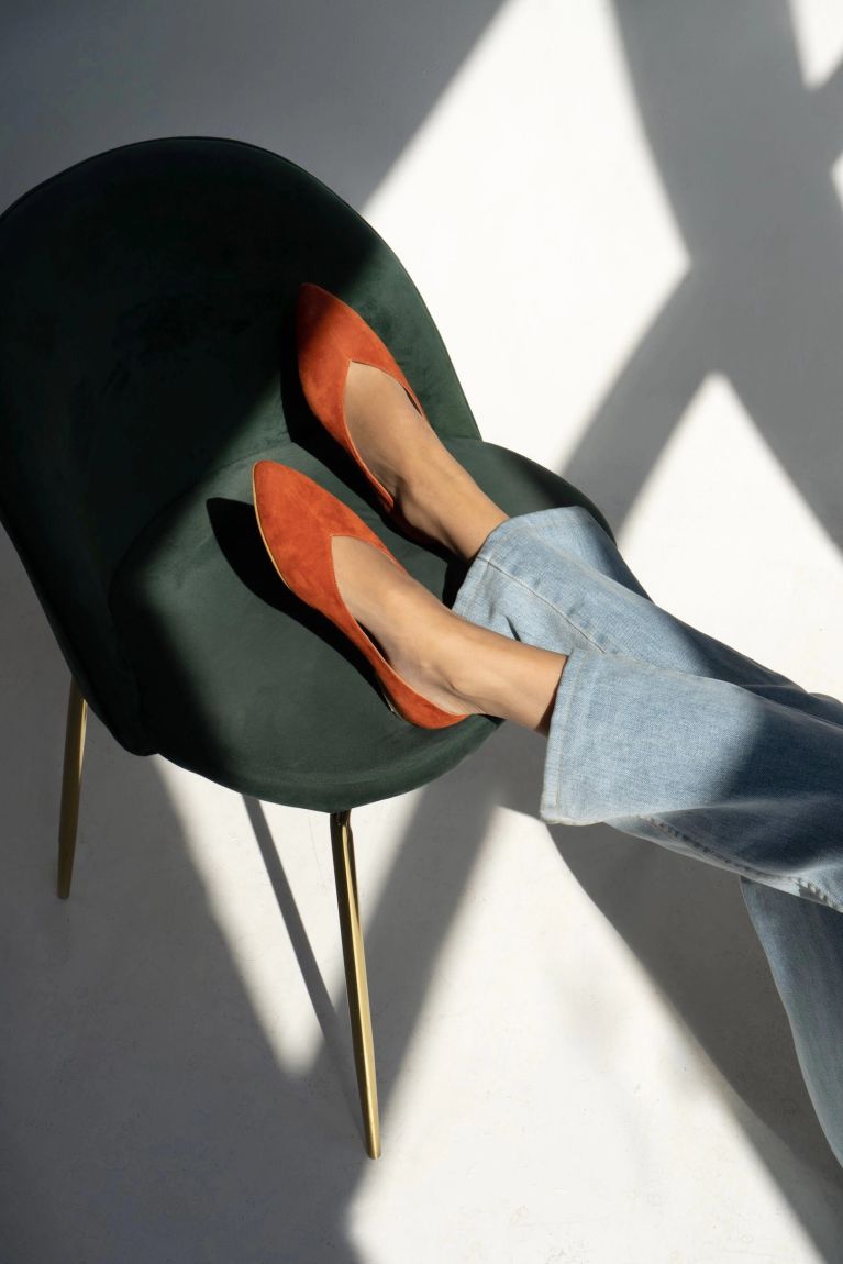 Orange suede ballet flats