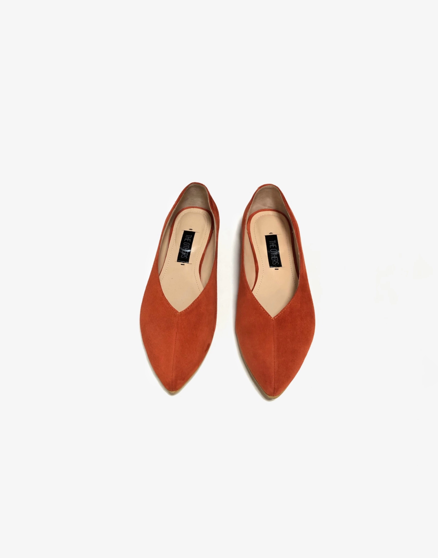 Orange suede ballet flats