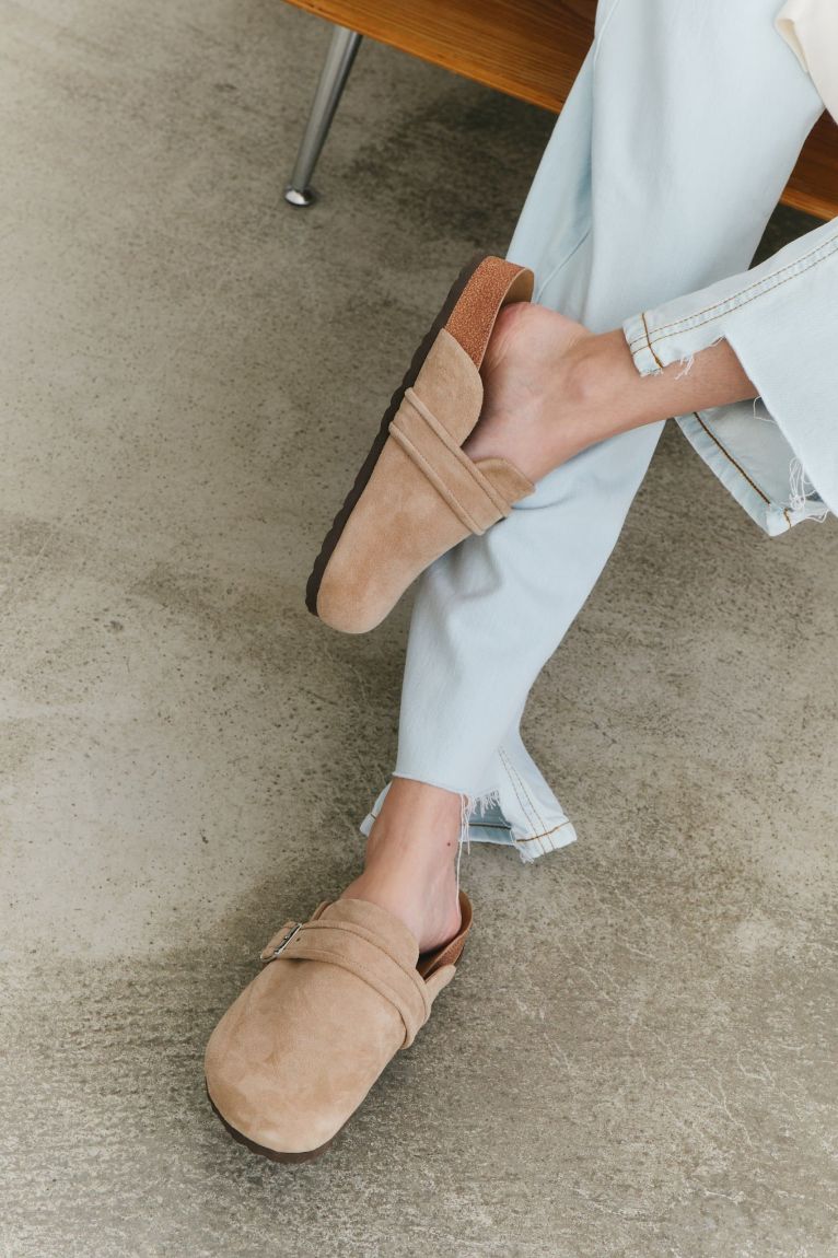 Beige suede clogs