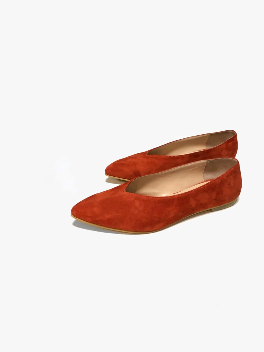 Orange suede ballet flats