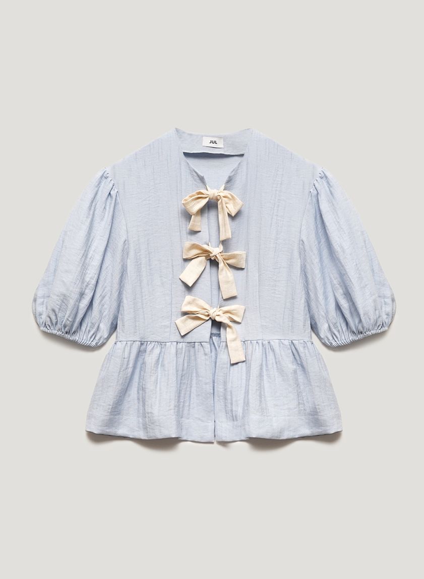 Blue blouse with bows