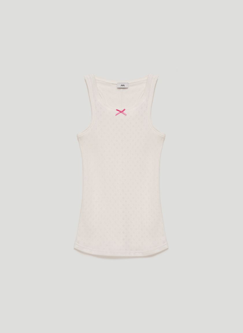 Milk tank top made of perforated fabric