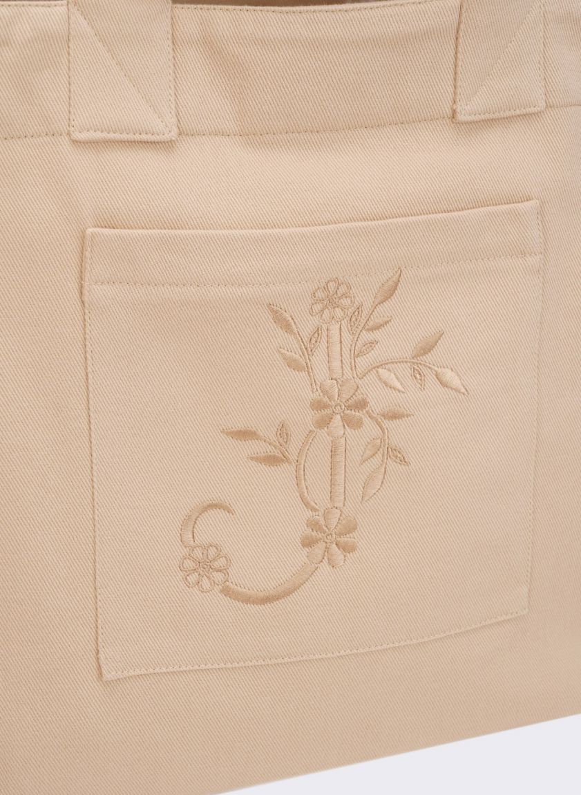 Beige shopper bag with an embroidery