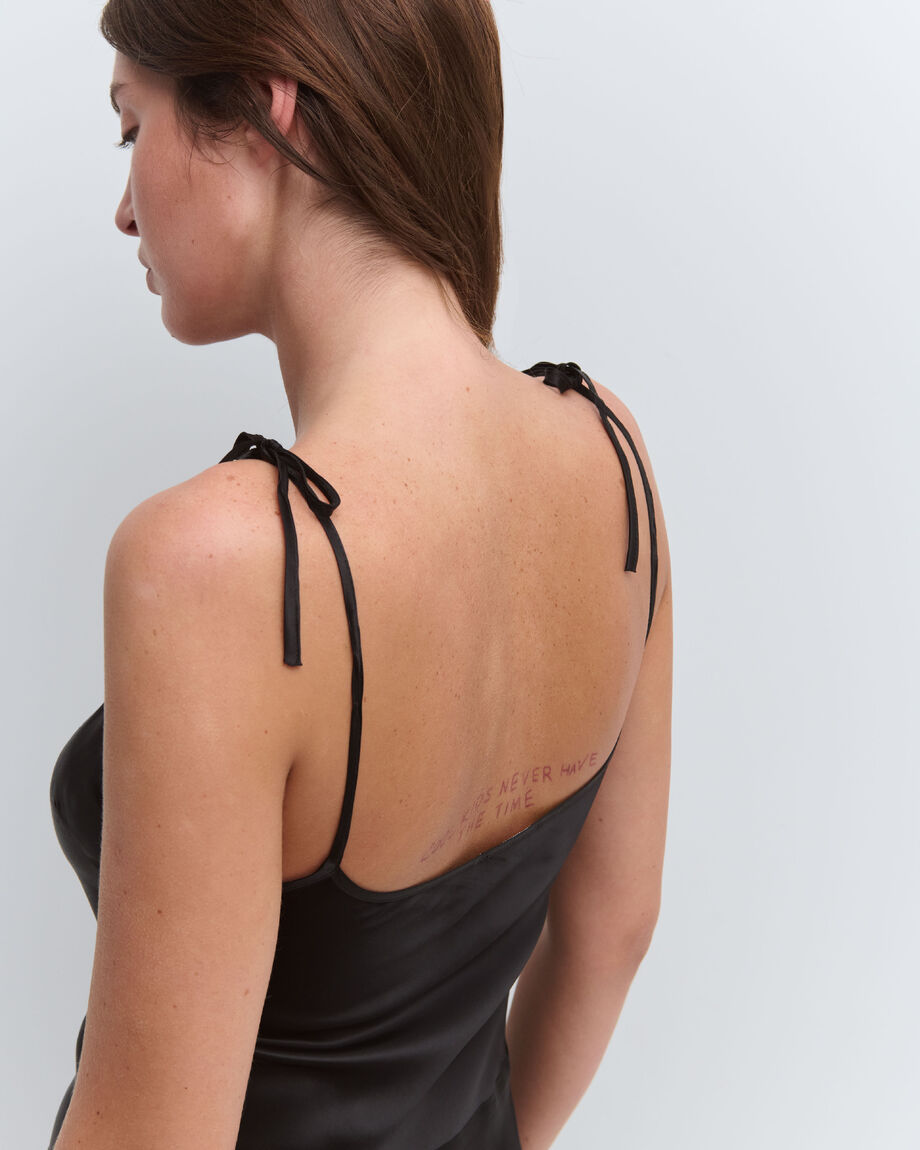 Black asymmetric slip dress