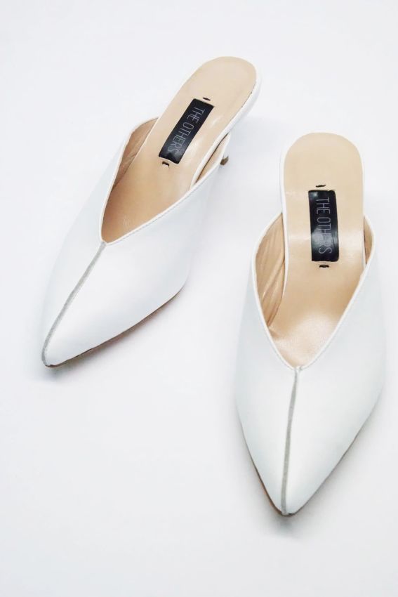 White leather mules with kitten heels