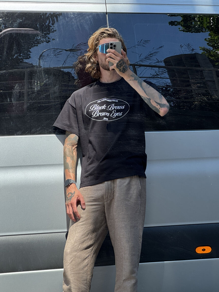 Black unisex T-shirt "Black Brows, Brown Eyes"