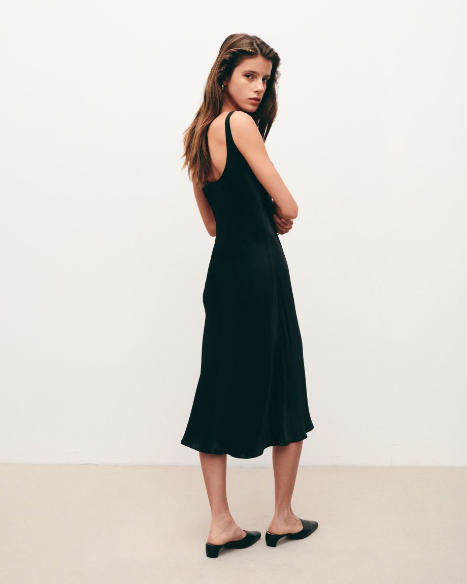 Black midi slip dress with an open back