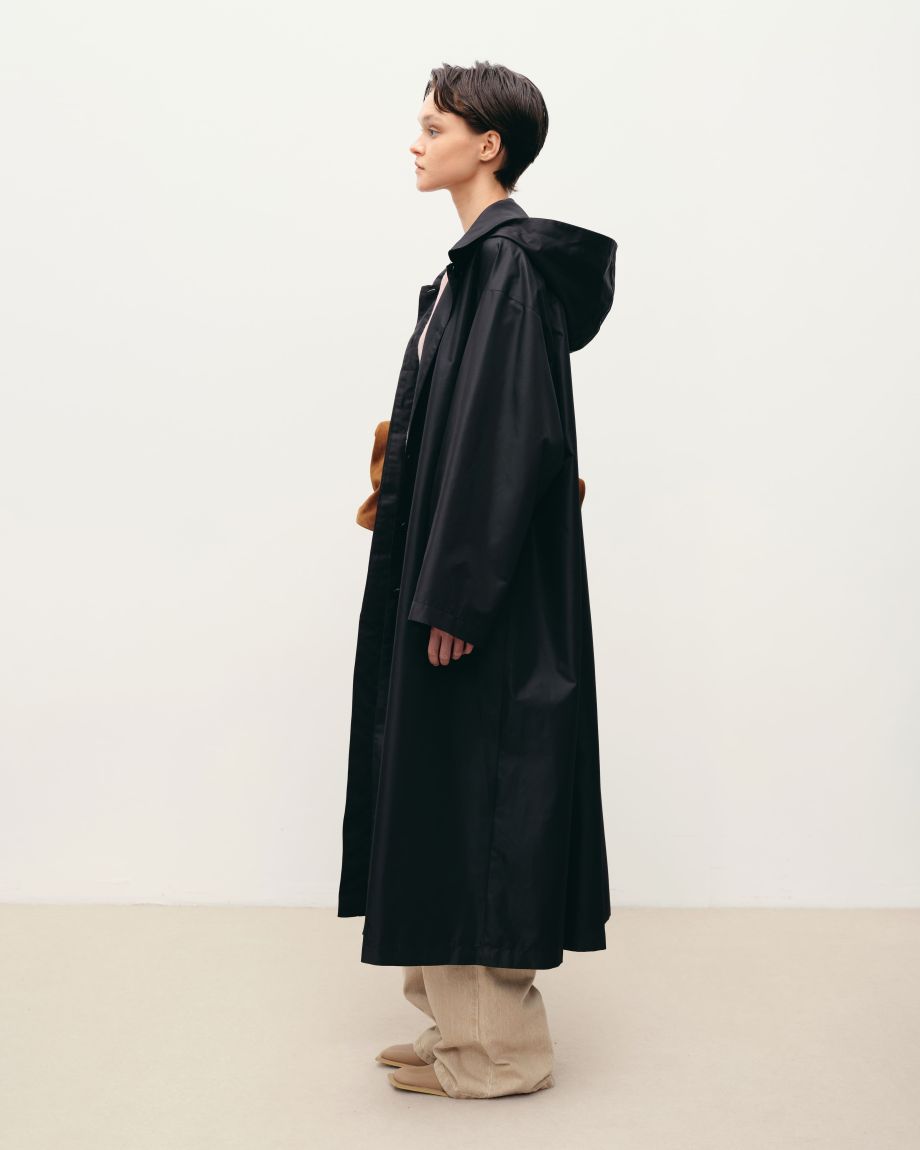 Black oversized raincoat with a hood