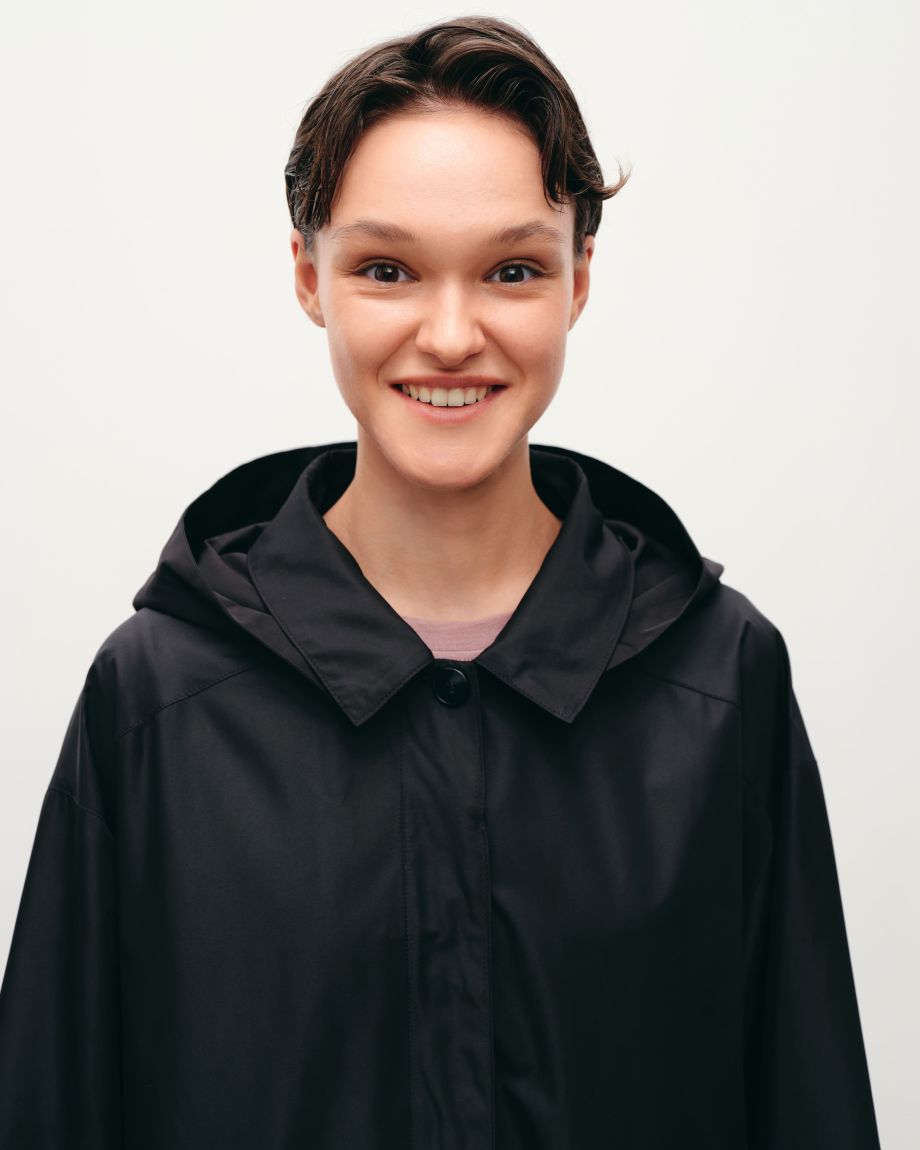 Black oversized raincoat with a hood