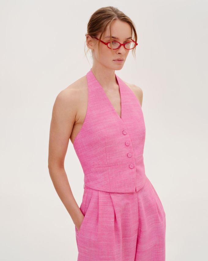 Fuchsia vest with an open back 