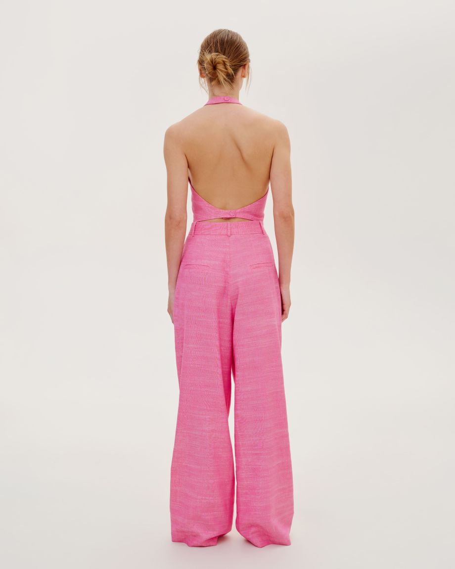 Fuchsia vest with an open back 