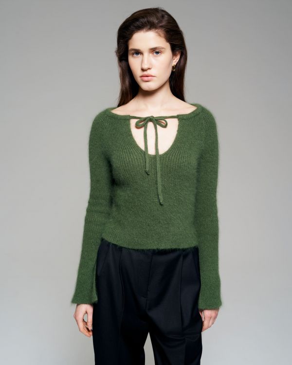 Green sweater with open shoulders