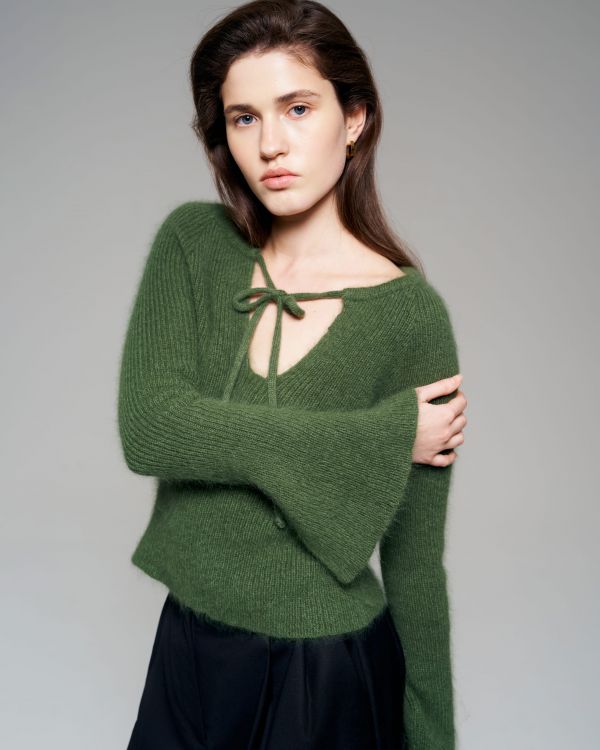 Green sweater with open shoulders