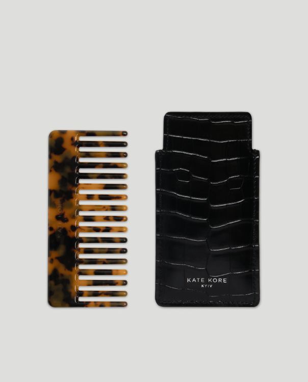 Amber hair comb with a black Croco case