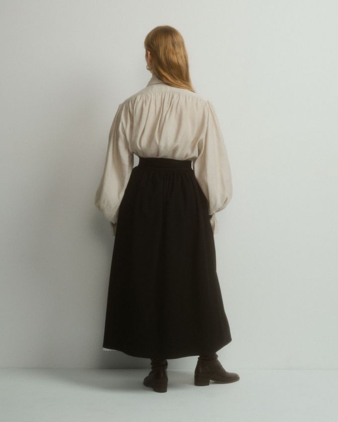 Black midi skirt with a belt