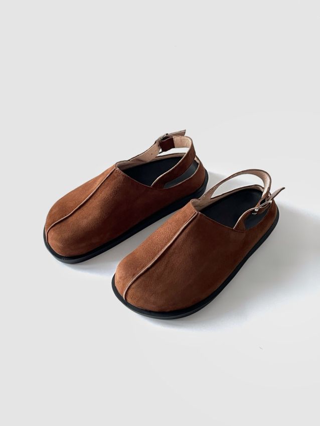 Brown suede clogs