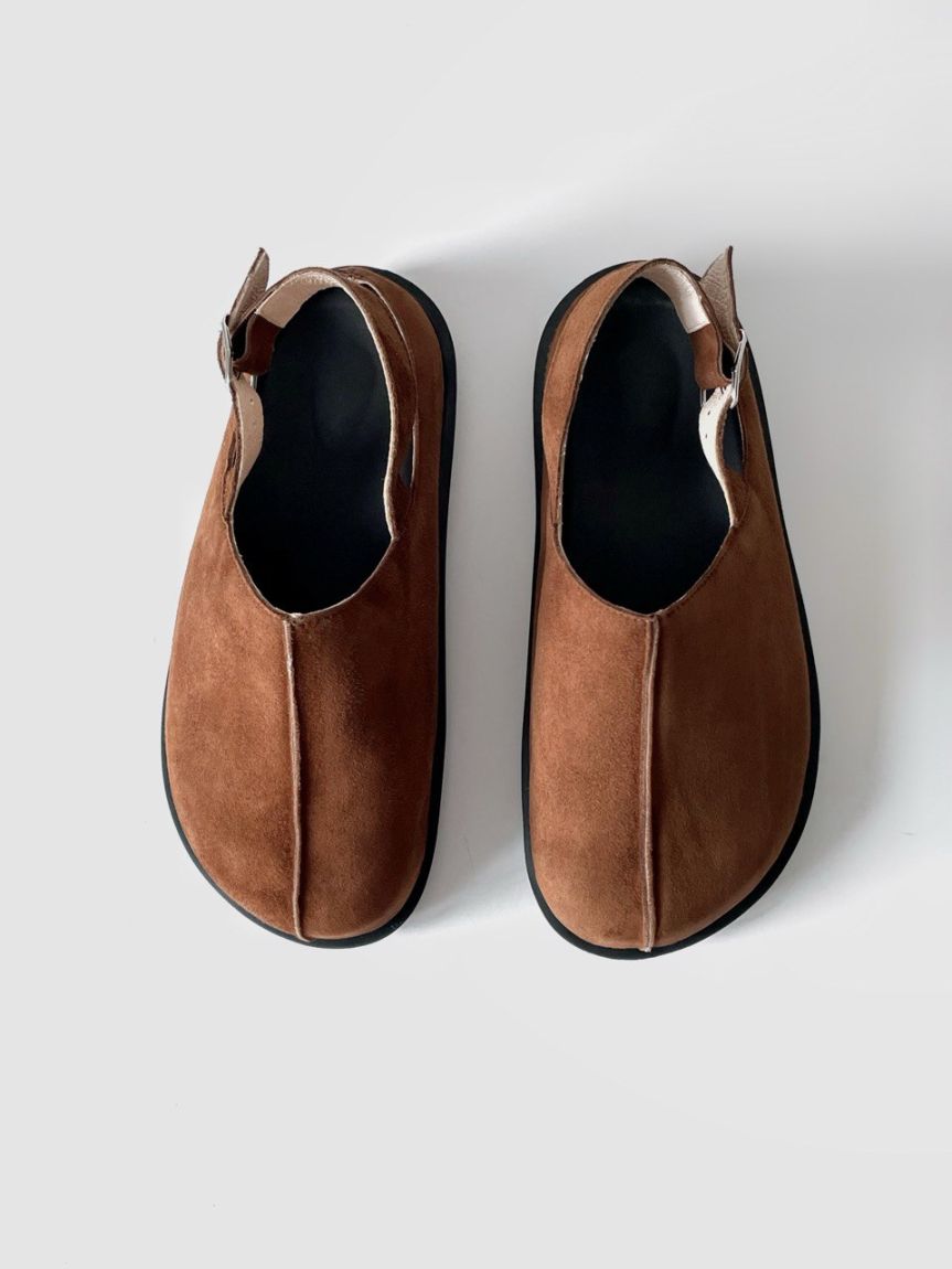 Brown suede clogs