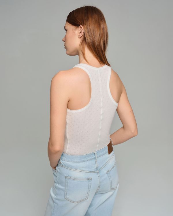 Milk tank top made of perforated fabric