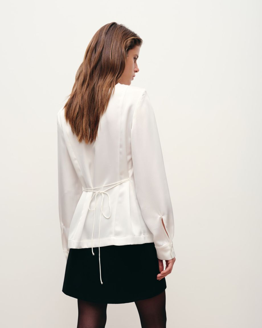 Milk blouse with a belt